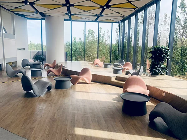 Commercial workspace project, sculptural leisure accent chairs for office lobby relaxation zone