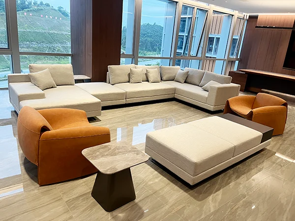 Commercial office project, large L-shaped sectional fabric office sofa with accent armchairs