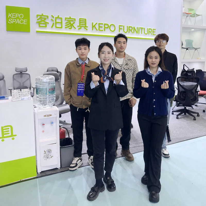 KEPO-SPACE sales team at office furniture exhibition booth, commercial office chair and sofa display