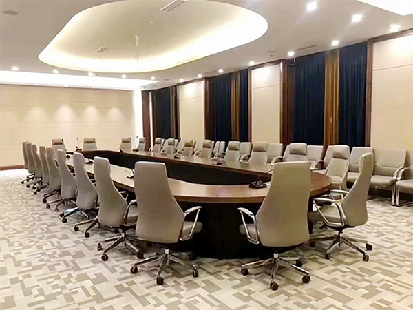 Commercial project, large curved conference room fitted with premium high back leather office chairs