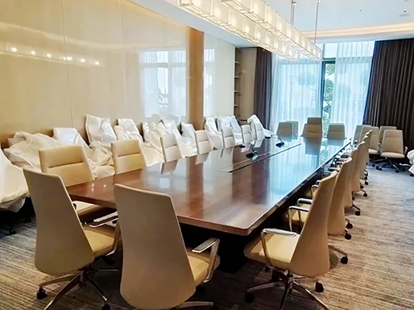 Commercial project delivery site, beige mid-back leather conference chairs for luxury meeting room fitout
