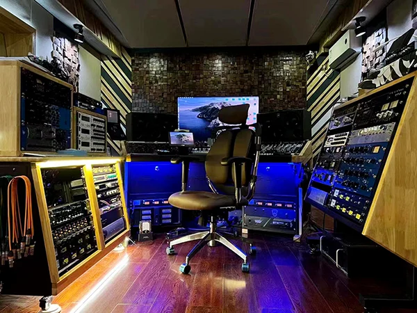 Commercial project, ergonomic leather office chair installed in audio recording studio workspace